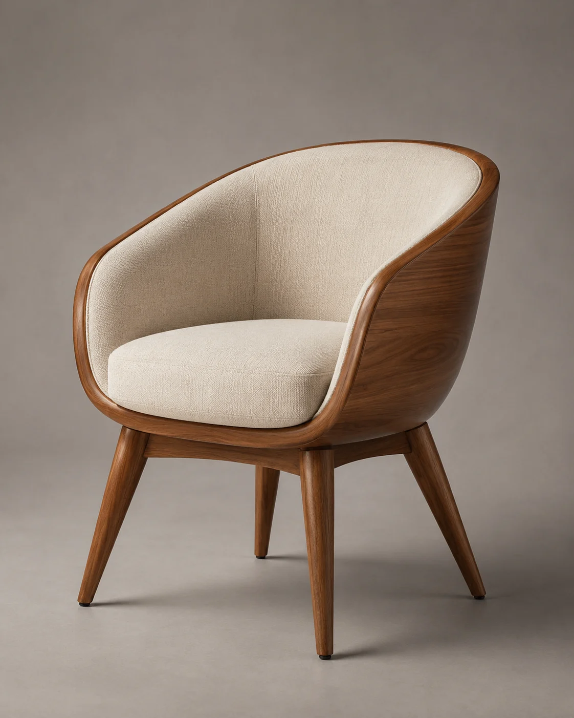Curved wooden upholstered chair centered on a neutral studio floor with soft shadows and warm wood grain.