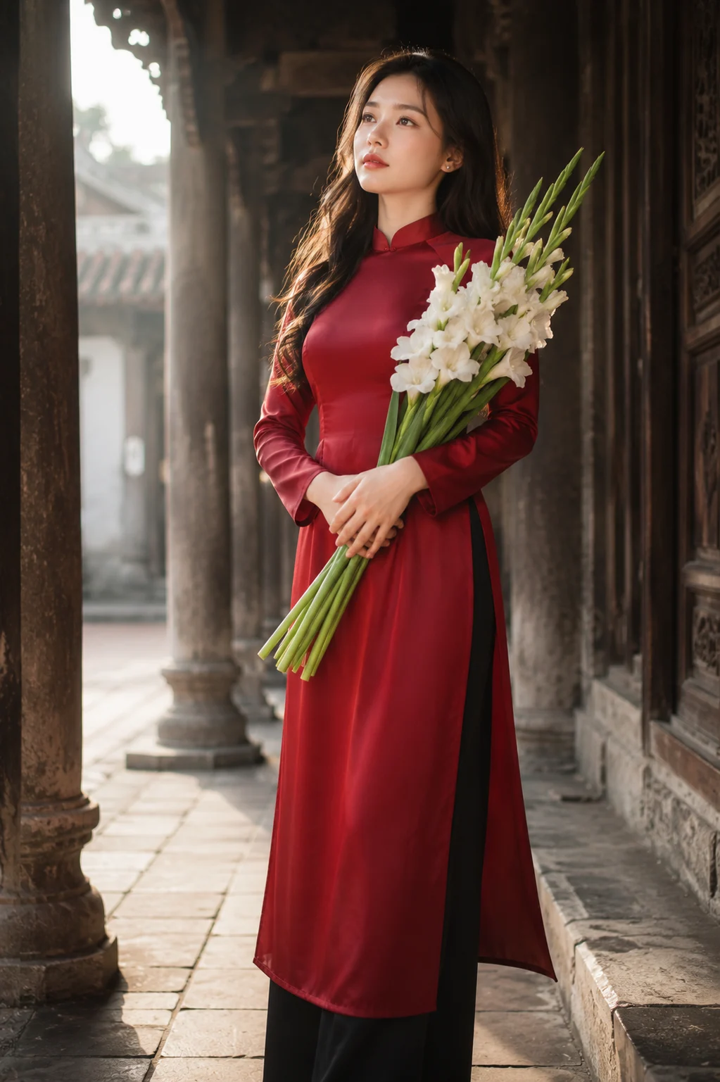 Natural light editorial portrait with crimson silk áo dài and white flowers.