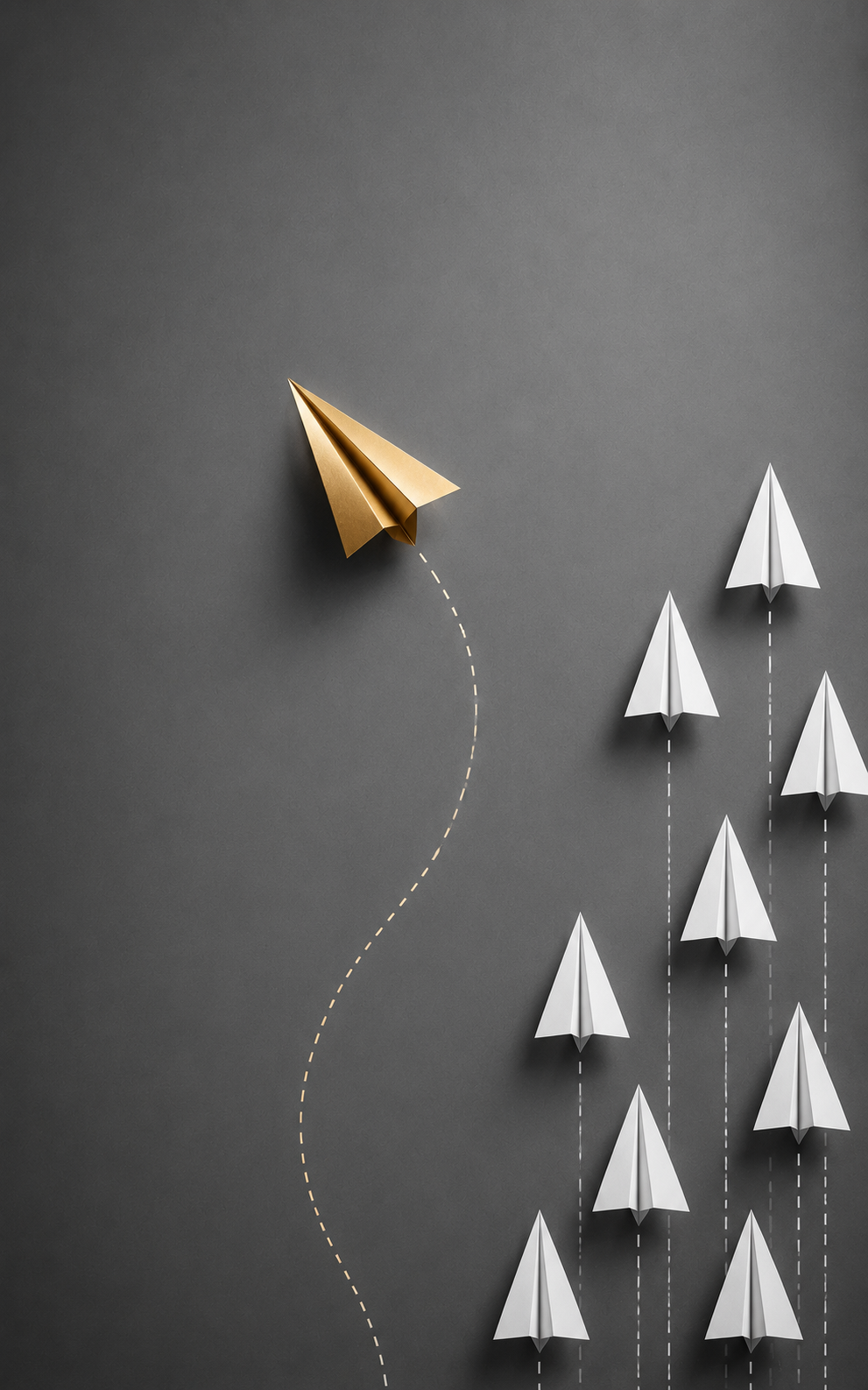 Minimal gray wallpaper with one gold paper plane flying diagonally away from several white paper planes and dashed motion paths.