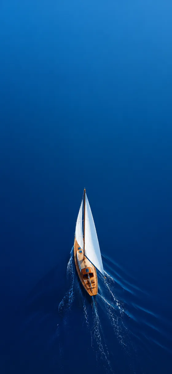 Top-down illustration of a wooden sailboat with white sails on a calm blue ocean.