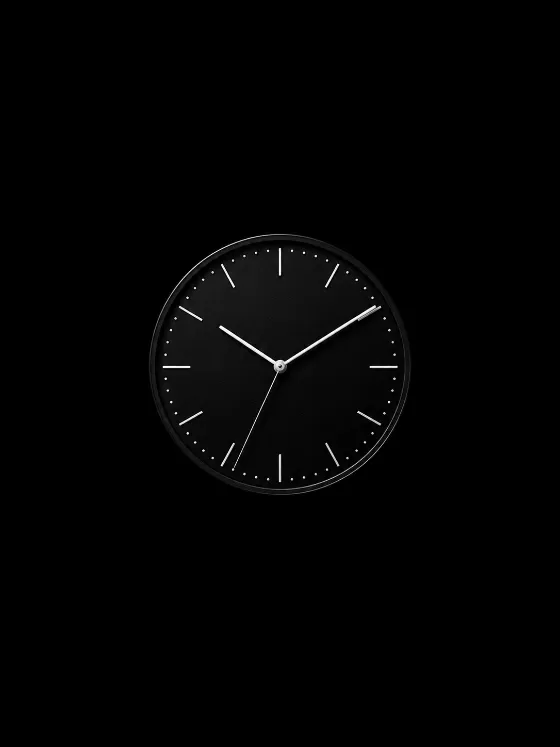 Minimal black analog watch dial with white hands, thin markers, and dot minute track on a pure black background.