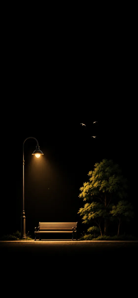 Minimal dark wallpaper showing an empty park bench under a warm streetlamp with rounded trees and small birds.