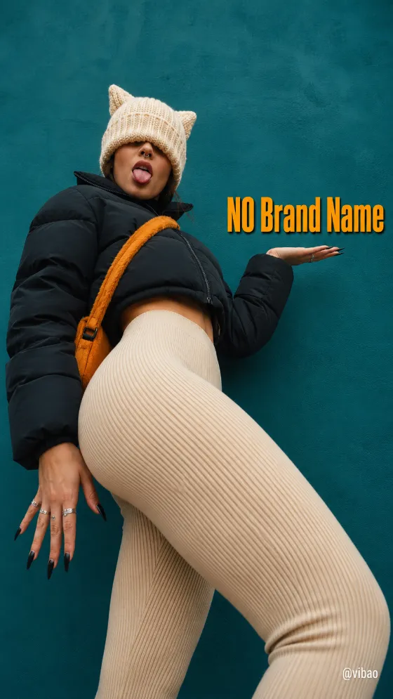 Playful wide-angle streetwear portrait with a cream knit hat, black puffer jacket, and teal background.