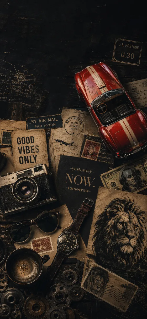 Dark phone lock screen artwork featuring a red classic convertible, lion illustrations, mechanical objects, air mail ephemera, and distressed archival textures.